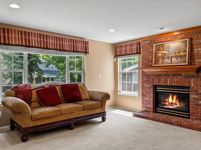 8953 W Brandt Pl, Littleton, CO 80123 - living area featuring carpet floors, a fireplace, and recessed lighting
