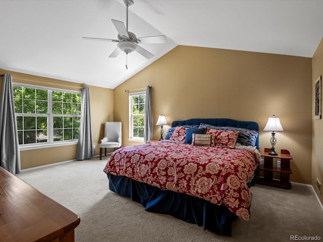 8953 W Brandt Pl, Littleton, CO 80123 - carpeted bedroom with lofted ceiling, multiple windows, and a ceiling fan