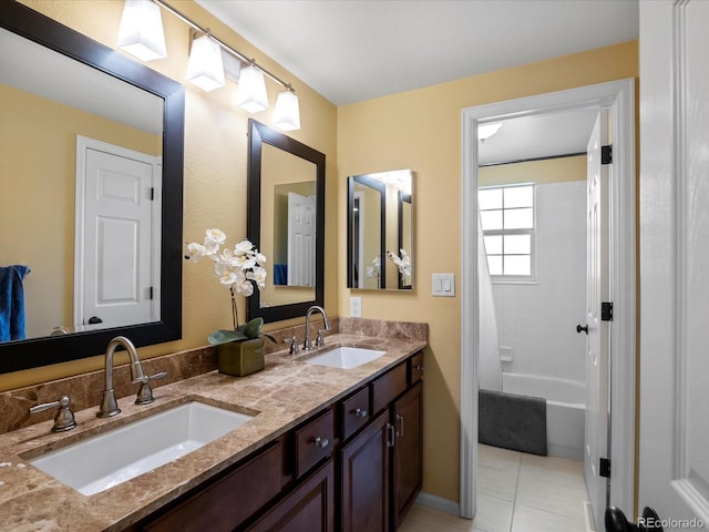 8953 W Brandt Pl, Littleton, CO 80123 - bathroom with double vanity, tile patterned floors, and shower / bath combination with curtain