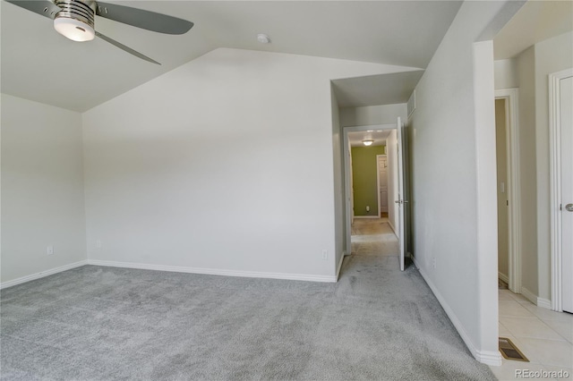 bonus room featuring light colored carpet, ceiling fan, and vaulted ceiling