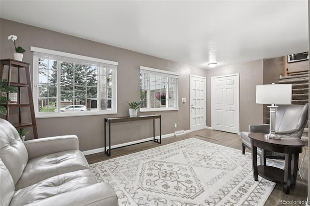 6514 Zinnia St, Arvada, CO 80004 - living area with baseboards and wood finished floors
