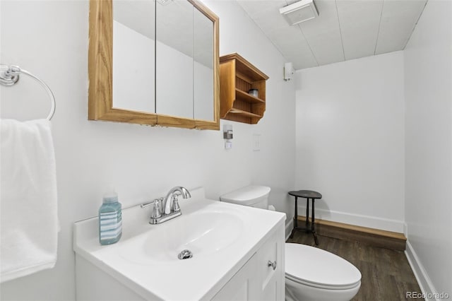 6514 Zinnia St, Arvada, CO 80004 - bathroom with wood finished floors and vanity