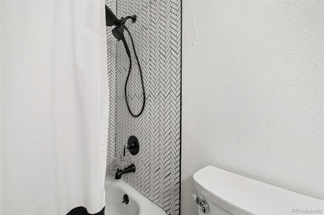 6514 Zinnia St, Arvada, CO 80004 - bathroom with toilet and shower / tub combo with curtain