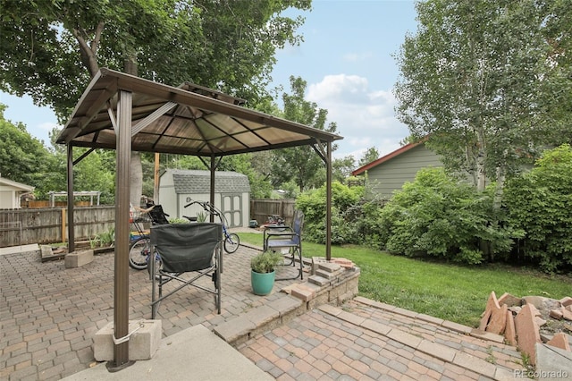 6514 Zinnia St, Arvada, CO 80004 - fenced backyard featuring a storage unit and a patio