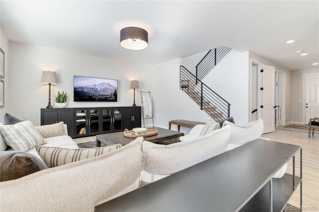 living room with light hardwood / wood-style floors