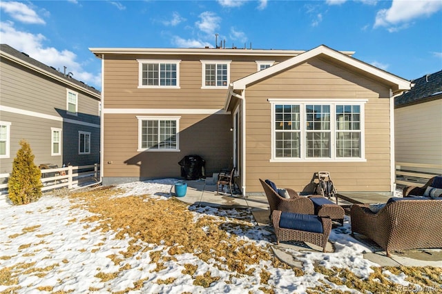 view of snow covered house