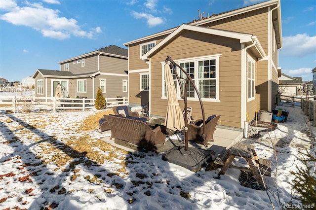 view of snow covered house