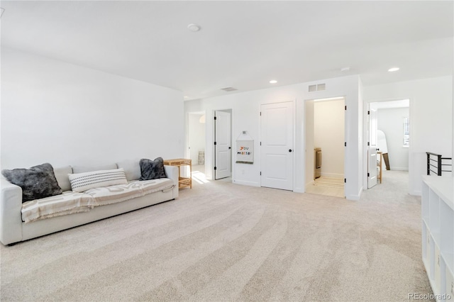 interior space featuring light colored carpet