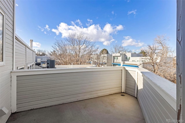 view of patio / terrace featuring a balcony and central AC unit