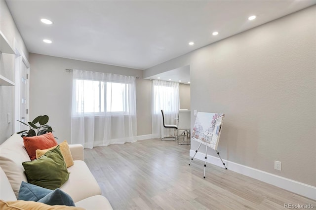 sitting room with light hardwood / wood-style floors