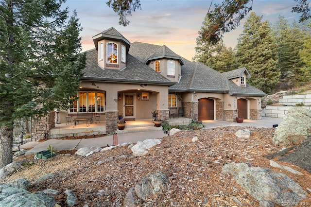 view of french country style house