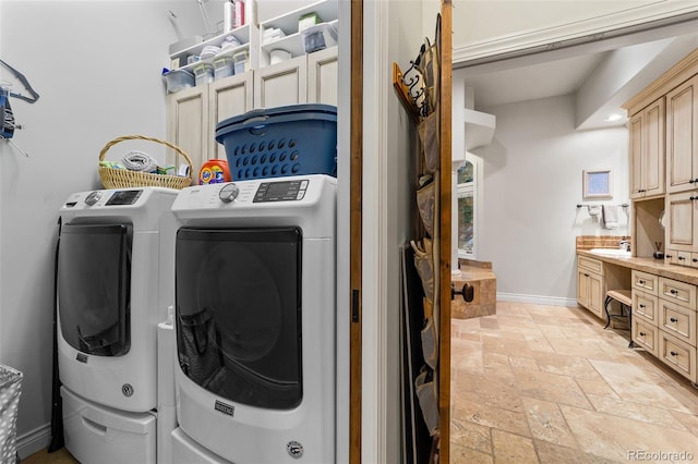 washroom featuring independent washer and dryer and sink