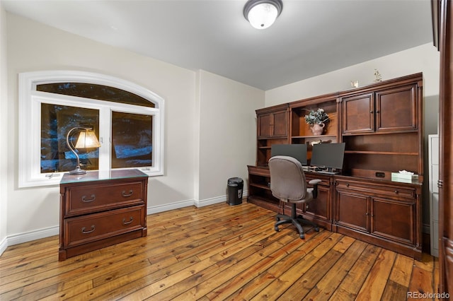 office area with light hardwood / wood-style flooring