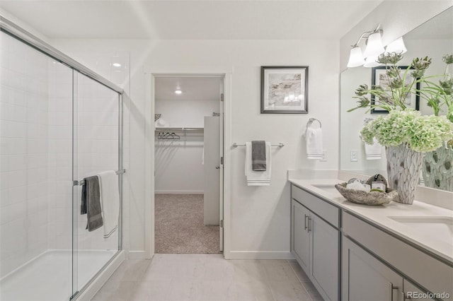 bathroom with vanity and walk in shower