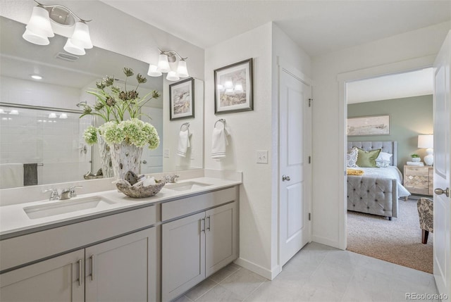 bathroom featuring vanity, tile patterned floors, walk in shower, and a notable chandelier