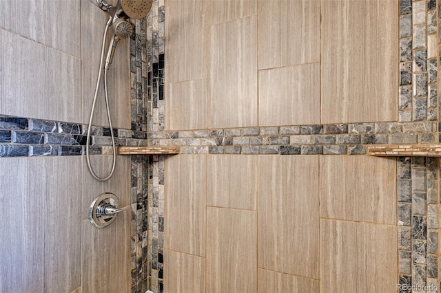 room details with a tile shower