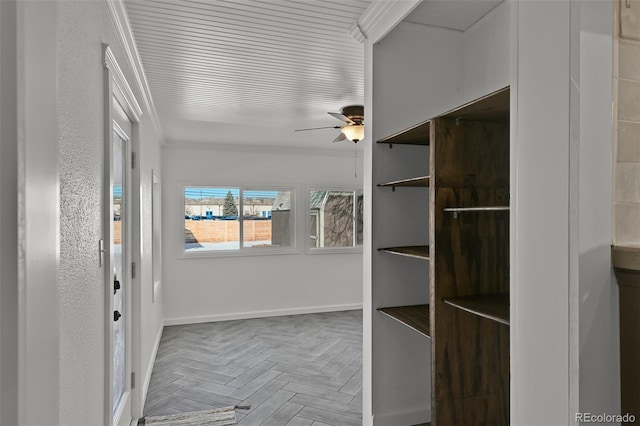 interior space featuring crown molding and parquet flooring