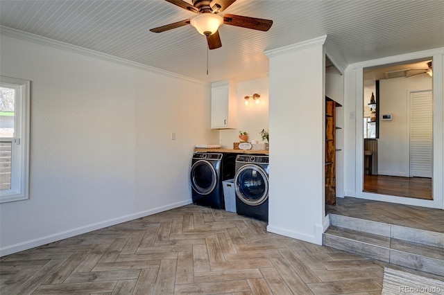 laundry area with ceiling fan, ornamental molding, light parquet flooring, and separate washer and dryer