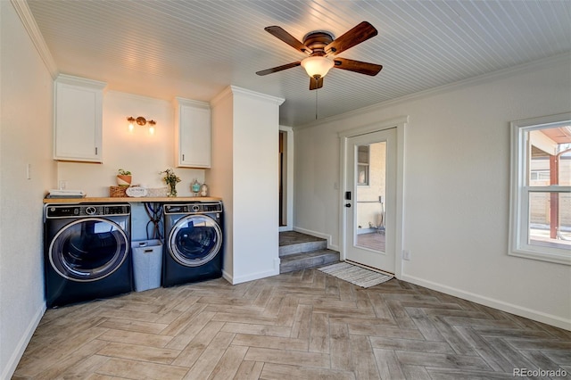 washroom featuring ceiling fan, washer and clothes dryer, ornamental molding, and light parquet flooring