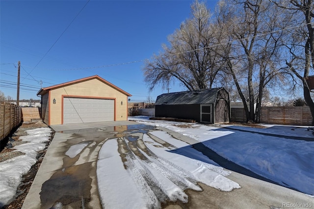 view of snow covered garage