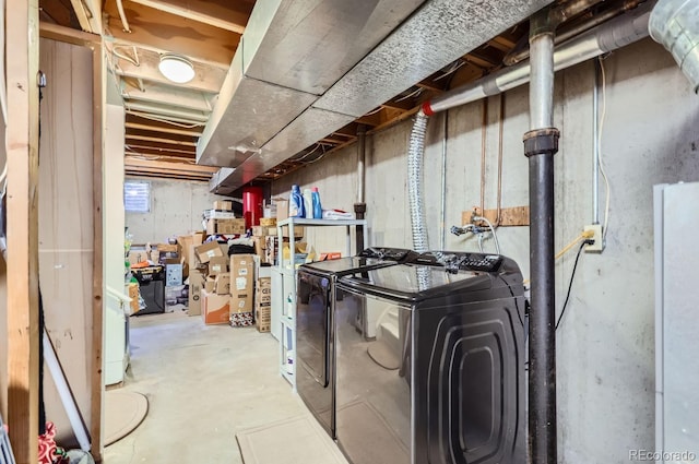 basement featuring washer and clothes dryer