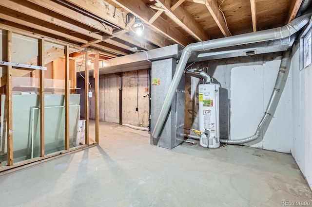 basement with water heater and heating unit