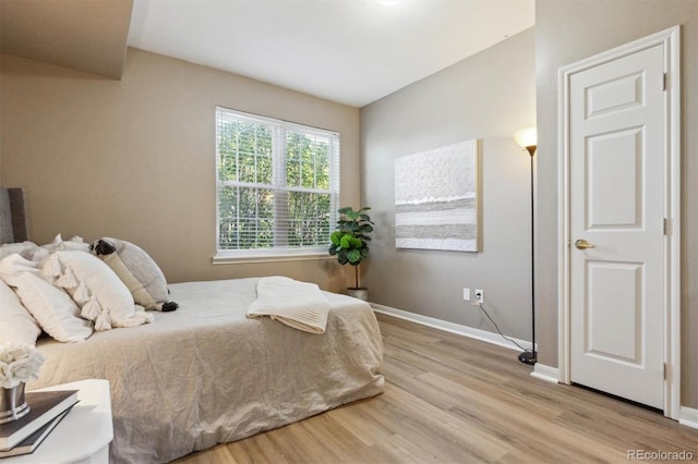 12914 Ironstone Way Unit 102, Parker, CO 80134 - bedroom featuring light wood-style floors and baseboards