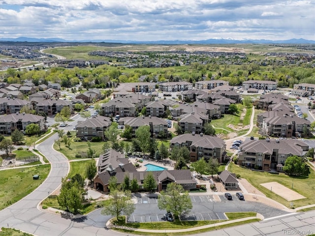 12914 Ironstone Way Unit 102, Parker, CO 80134 - bird's eye view of a pool and a mountain backdrop