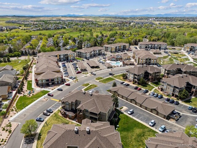 12914 Ironstone Way Unit 102, Parker, CO 80134 - aerial perspective of suburban area featuring a mountain backdrop