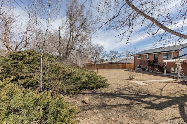 view of yard featuring fence