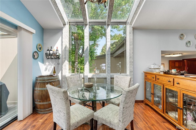 7300 W Stetson Pl Unit 46, Littleton, CO 80123 - dining room featuring wood finished floors and plenty of natural light
