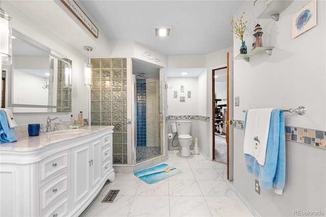 7300 W Stetson Pl Unit 46, Littleton, CO 80123 - bathroom with a shower stall, vanity, toilet, and marble finish floors