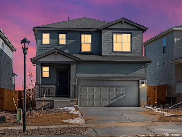 front of property featuring a garage