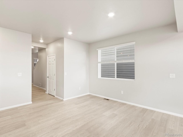 empty room featuring light hardwood / wood-style flooring