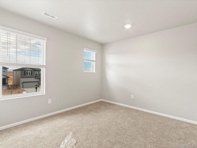 view of carpeted spare room