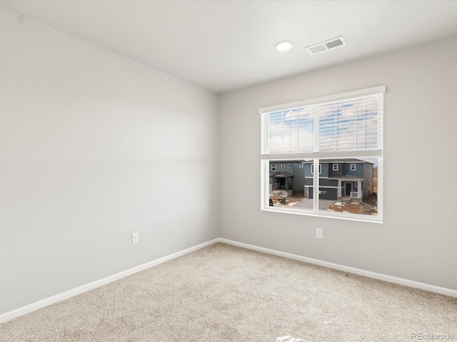 view of carpeted spare room