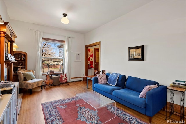 328 S Lincoln St, Denver, CO 80209 - living area with light wood finished floors and baseboards