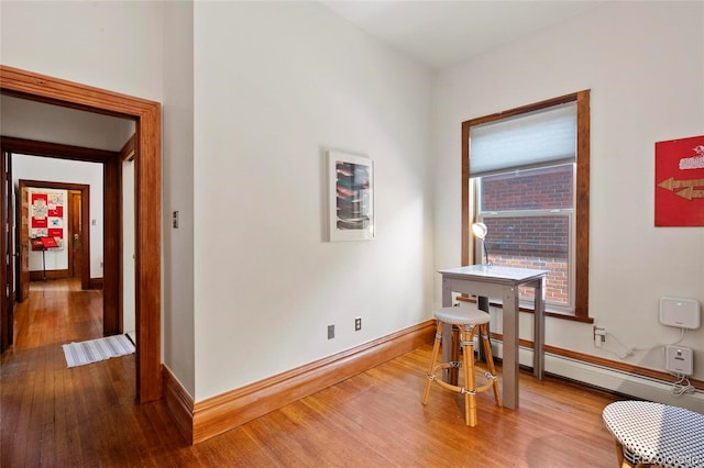 328 S Lincoln St, Denver, CO 80209 - dining area featuring wood finished floors and baseboards