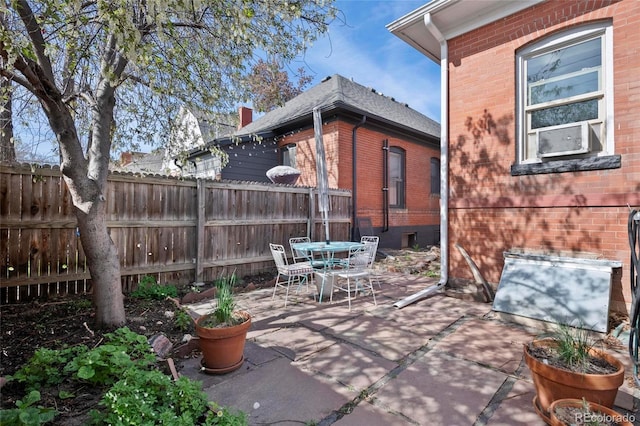 328 S Lincoln St, Denver, CO 80209 - view of patio with outdoor dining area and cooling unit