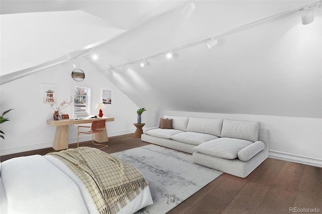 328 S Lincoln St, Denver, CO 80209 - living room with rail lighting, vaulted ceiling, wood finished floors, and baseboards