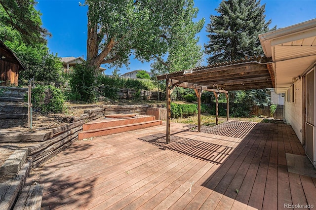 10171 W 69th Ave, Arvada, CO 80004 - wooden terrace featuring a fenced backyard and a pergola