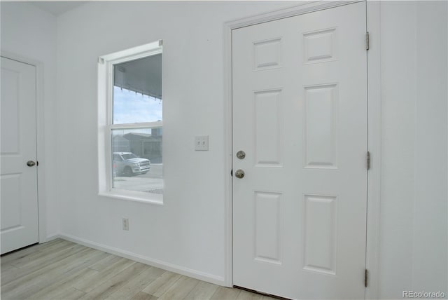 doorway with light hardwood / wood-style flooring