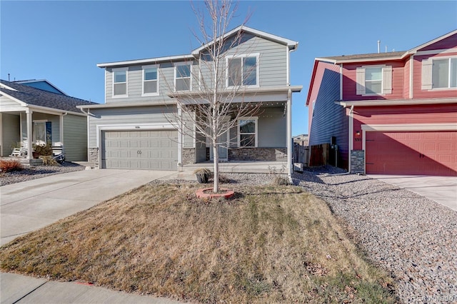 view of front of home featuring a front yard and a garage