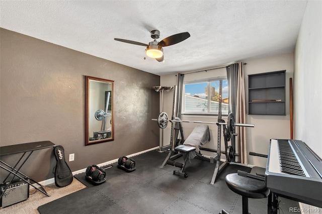 4475 London Ln, Colorado Springs, CO 80916 - workout area with baseboards, a textured wall, a ceiling fan, and a textured ceiling