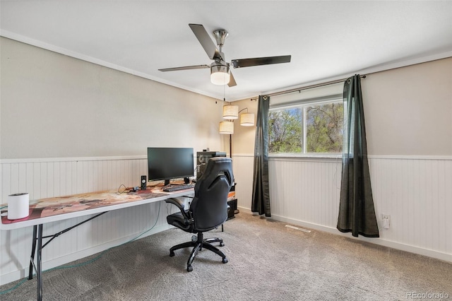 4475 London Ln, Colorado Springs, CO 80916 - carpeted office with a wainscoted wall and a ceiling fan