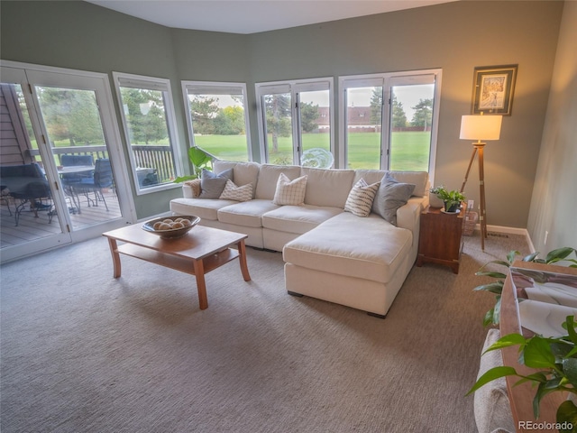 living room with carpet floors and baseboards