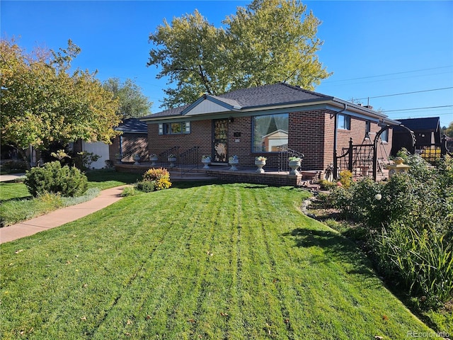 view of front of house with a front yard