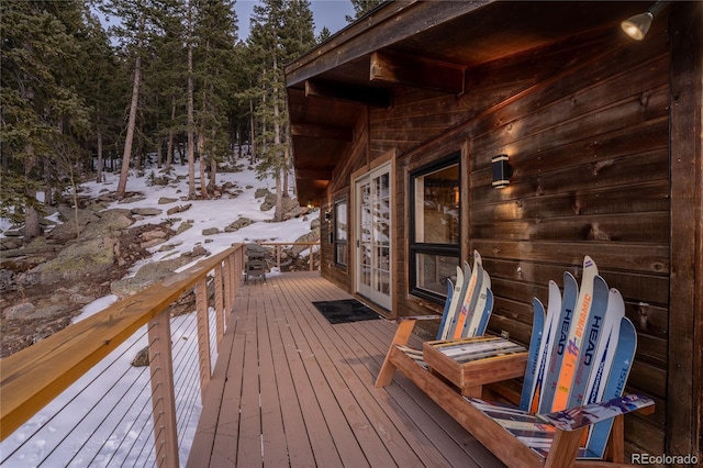wooden deck featuring french doors