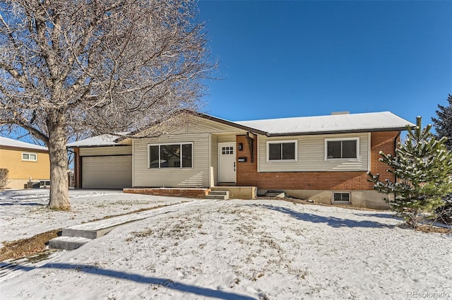 single story home with a garage