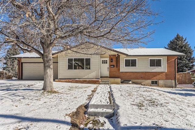 single story home featuring a garage